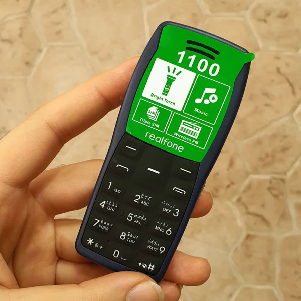 گوشی دکمه ای ری ال فون realfone 1100 سه سیم کارت 0