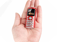 گوشی موبایل دکمه ای مینی انگشتی کوکاکولا mini mobile coca cola اورجینال